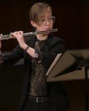 Cristabella playing the flute