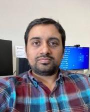 Shankar in plaid shirt