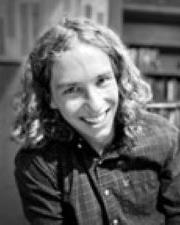 Nils black and white pic smiling